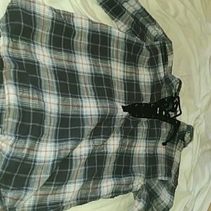 A plaid sweater with a tie up v-neck.